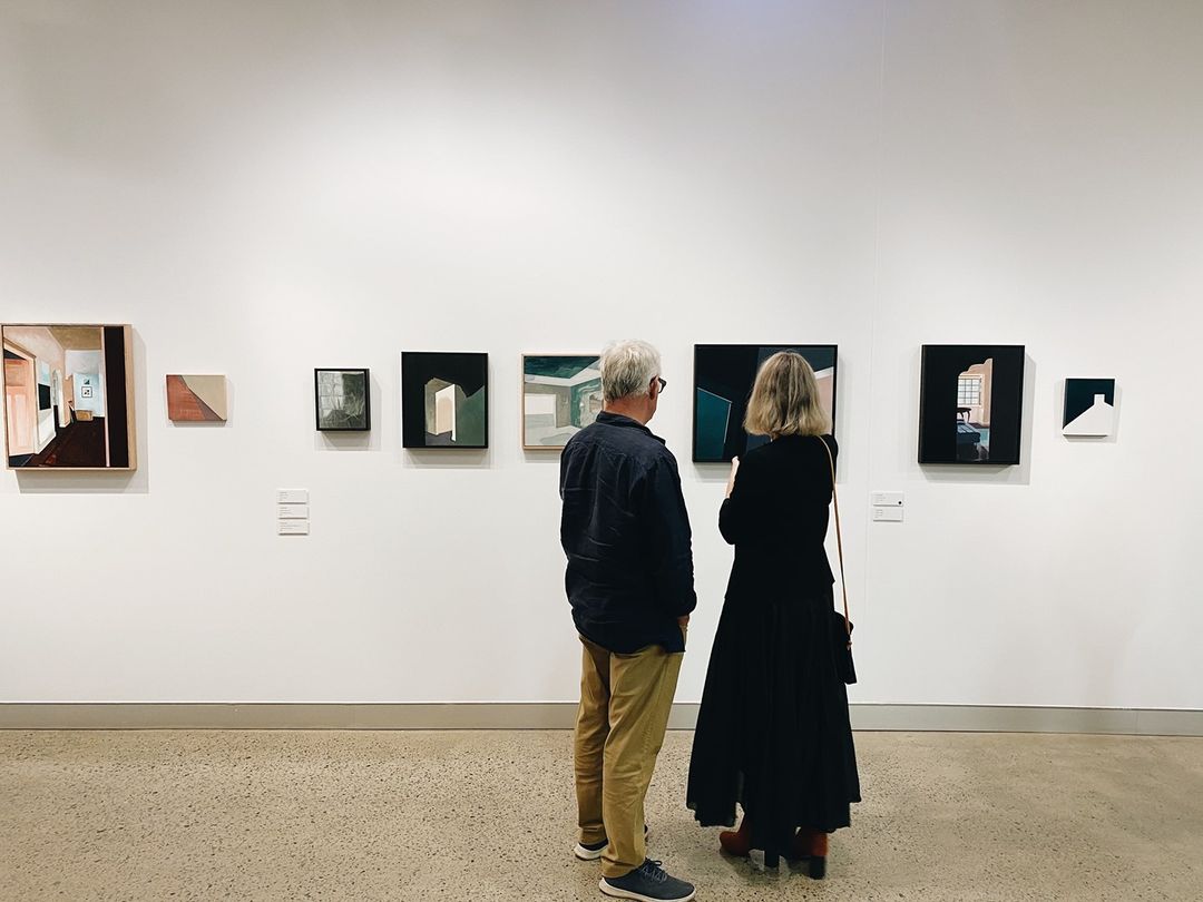 couple looking at art