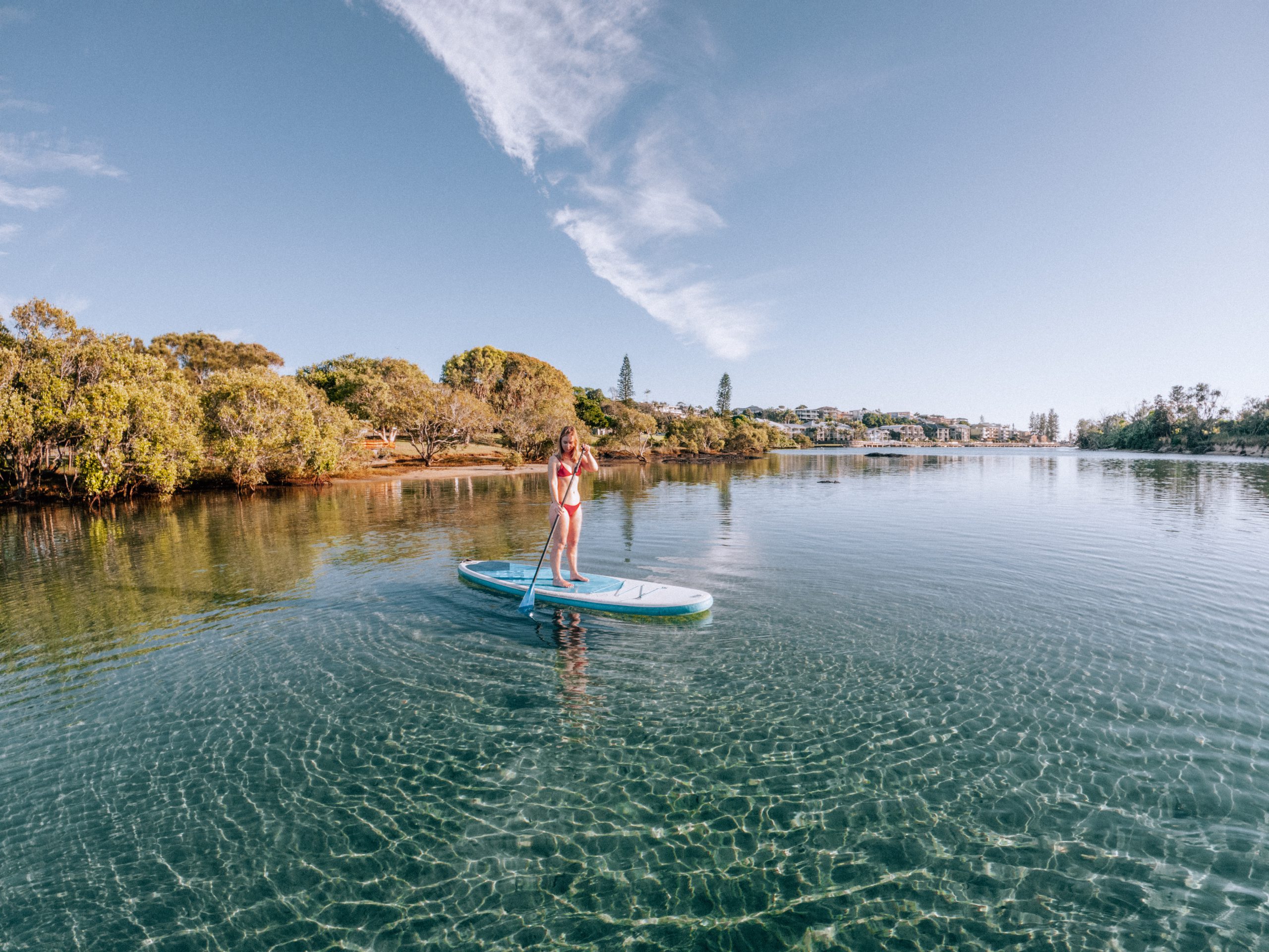 girl paddle boarding on cudgen creek