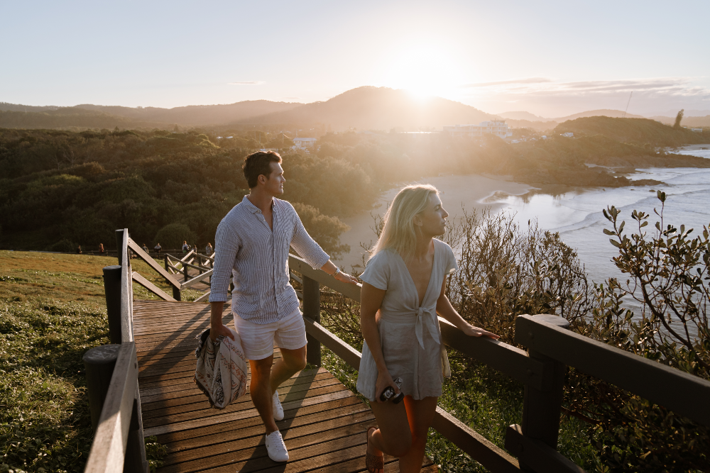 couple walking up norries headland